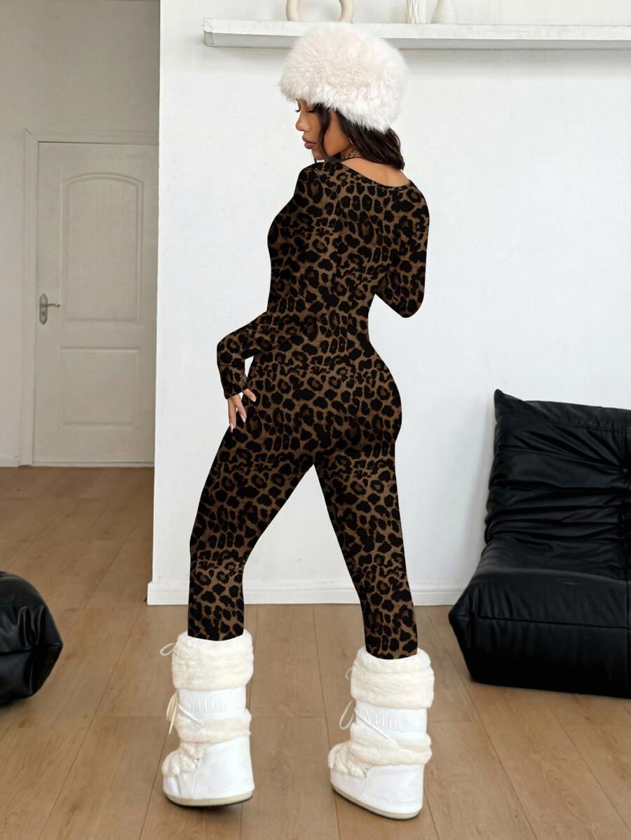 Black square neck long sleeve sport jumpsuit in rib-knit fabric with slim fit unitard silhouette for women.