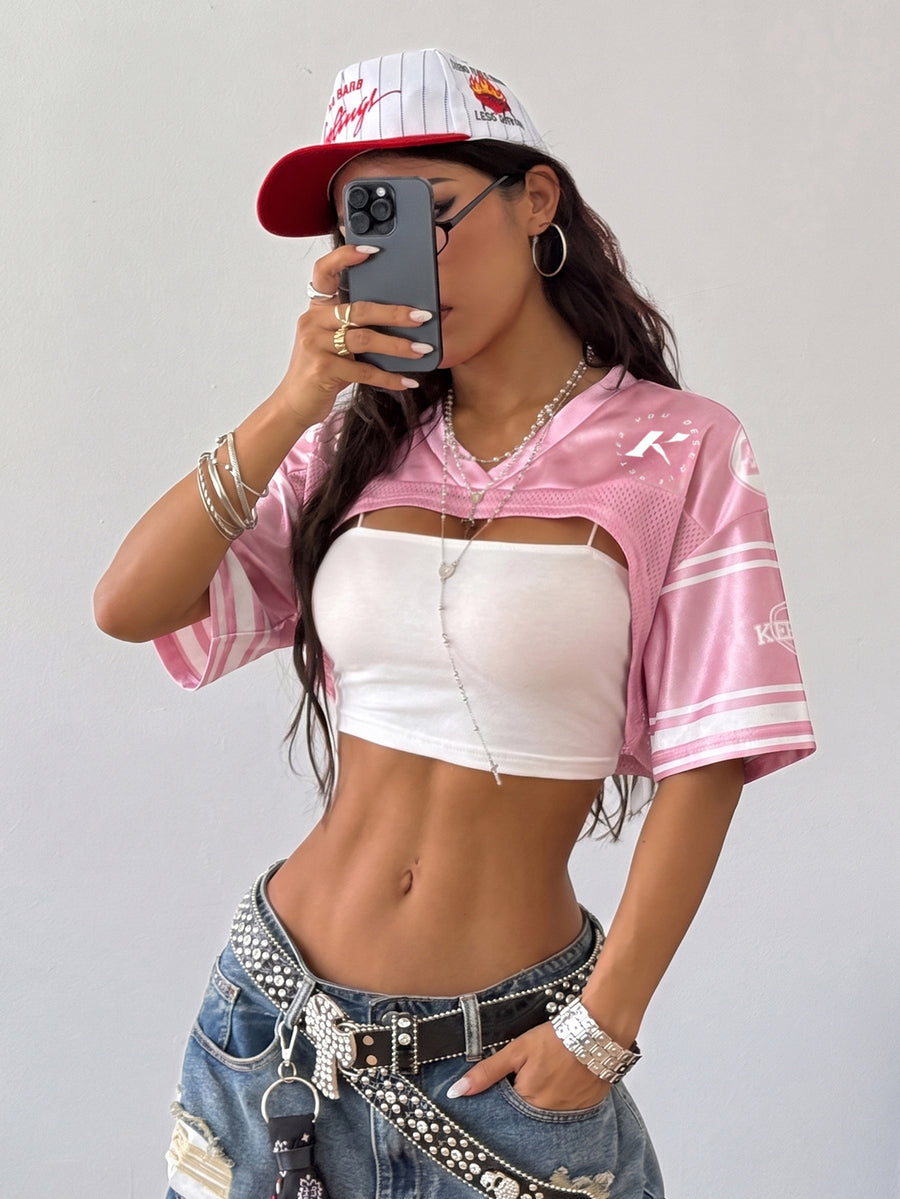 Front view of a women's black and white striped short sleeve crop top with a round neckline and semi-sheer knit finish.