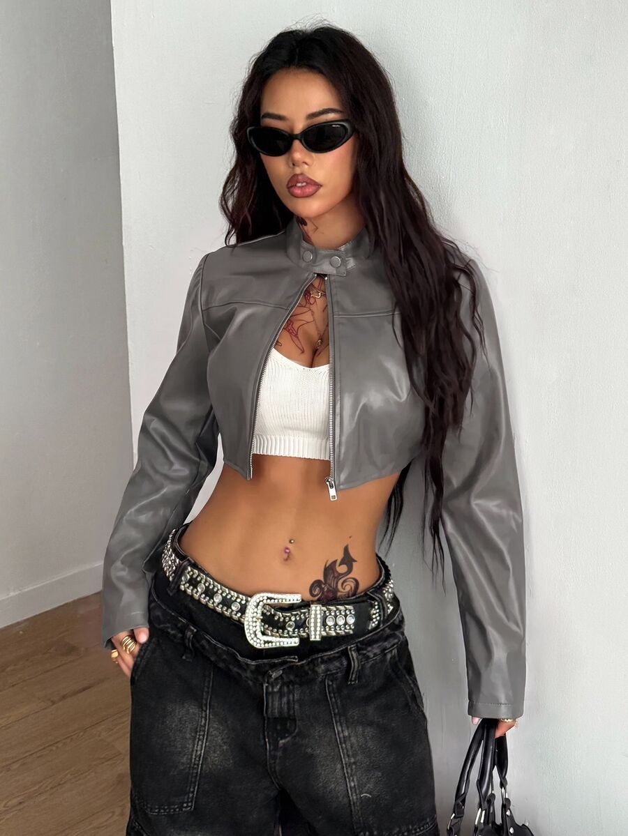Women's metallic grey cropped faux leather jacket featuring a stand collar and asymmetrical zip front closure.