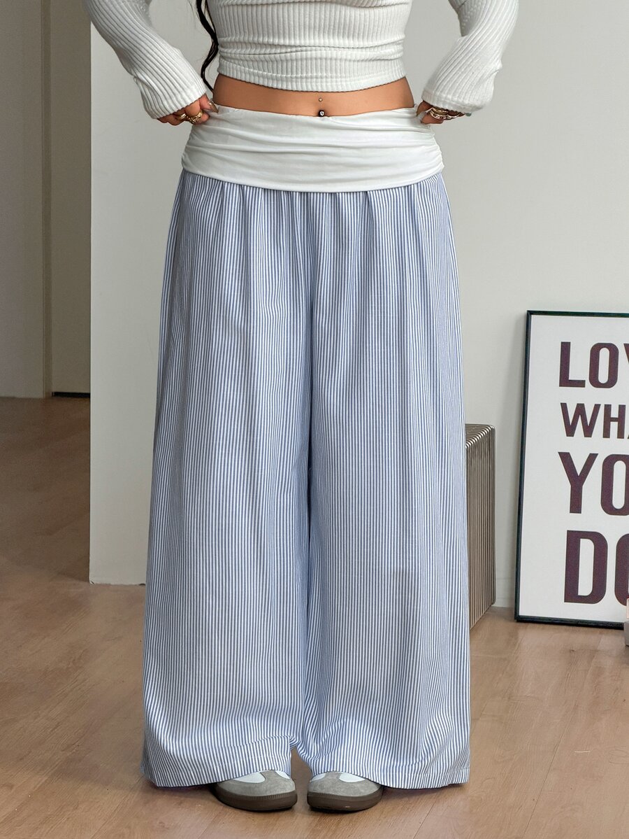 Women's plus size wide leg cotton pants featuring a relaxed loose fit and high waist design.