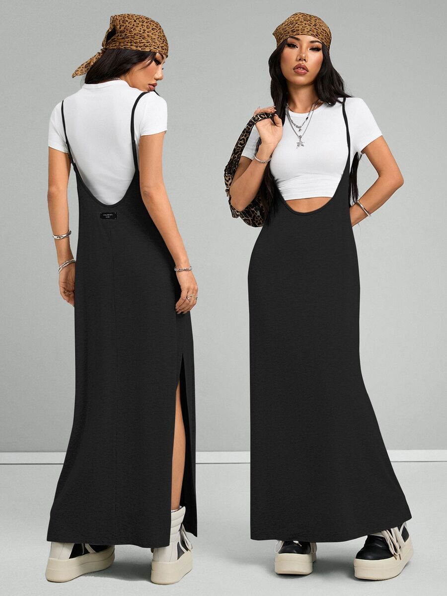 Sleeveless black cami maxi dress with spaghetti straps, textured knitted fabric, and a high thigh slit for women.