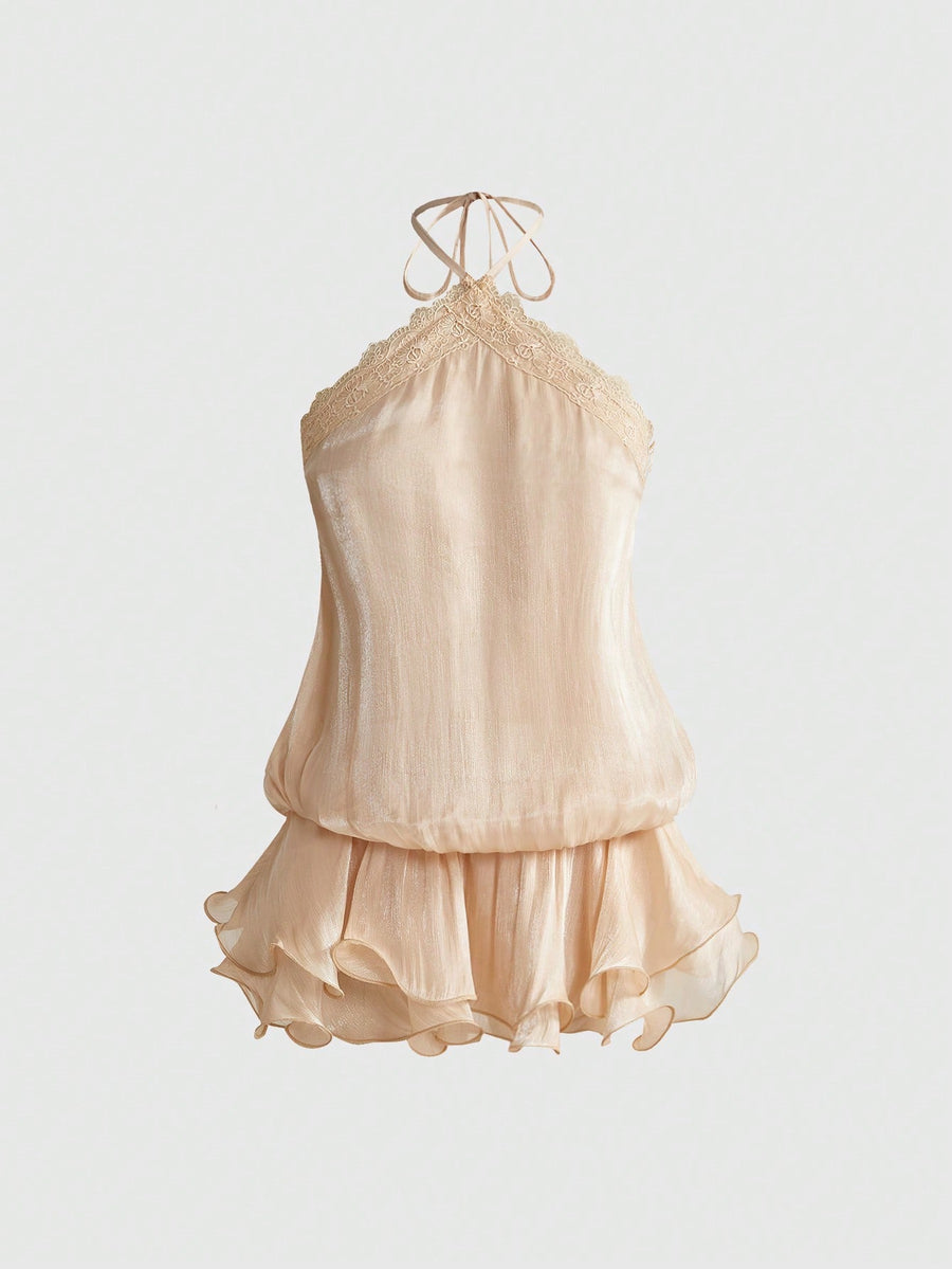 Front and back view of a women's halter neck sleeveless mini dress with contrast lace patchwork, tie knot backless detail, and layered ruffle hem.