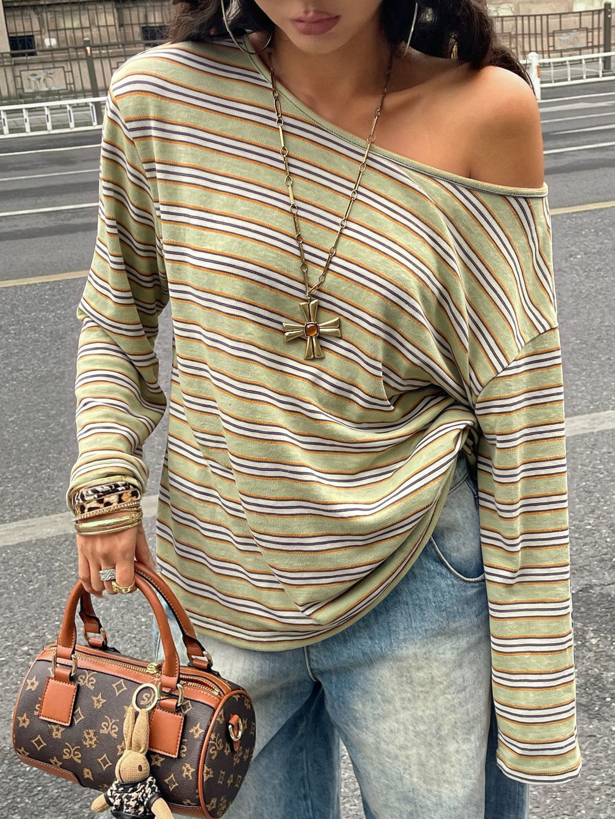 Women's brown striped boat neck long sleeve raglan T-shirt with a loose casual fit