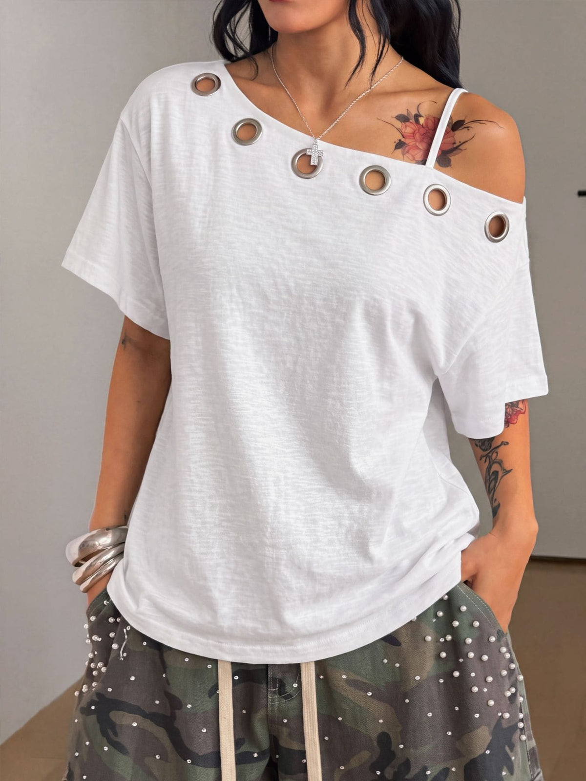 Women's casual loose fit cold shoulder cotton t-shirt with asymmetrical cutout neckline and short sleeves.
