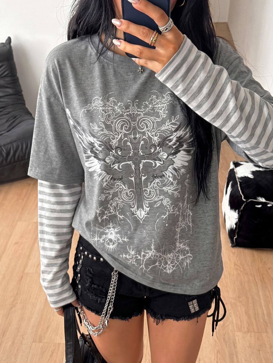 Women's casual graphic long sleeve t-shirt with a round neck, drop shoulder sleeves, and loose relaxed fit.