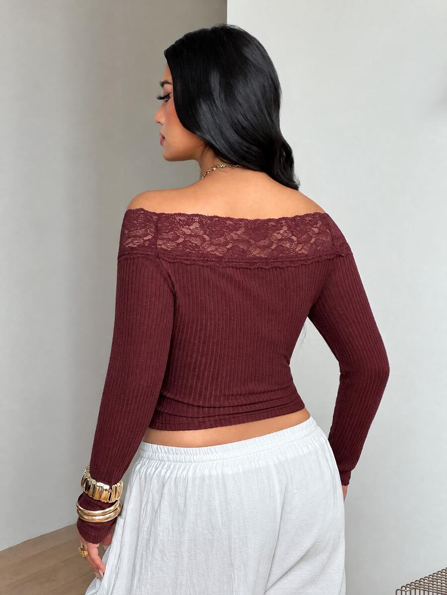 Women's striped off the shoulder long-sleeve top with contrast lace trim and ribbed knit texture.