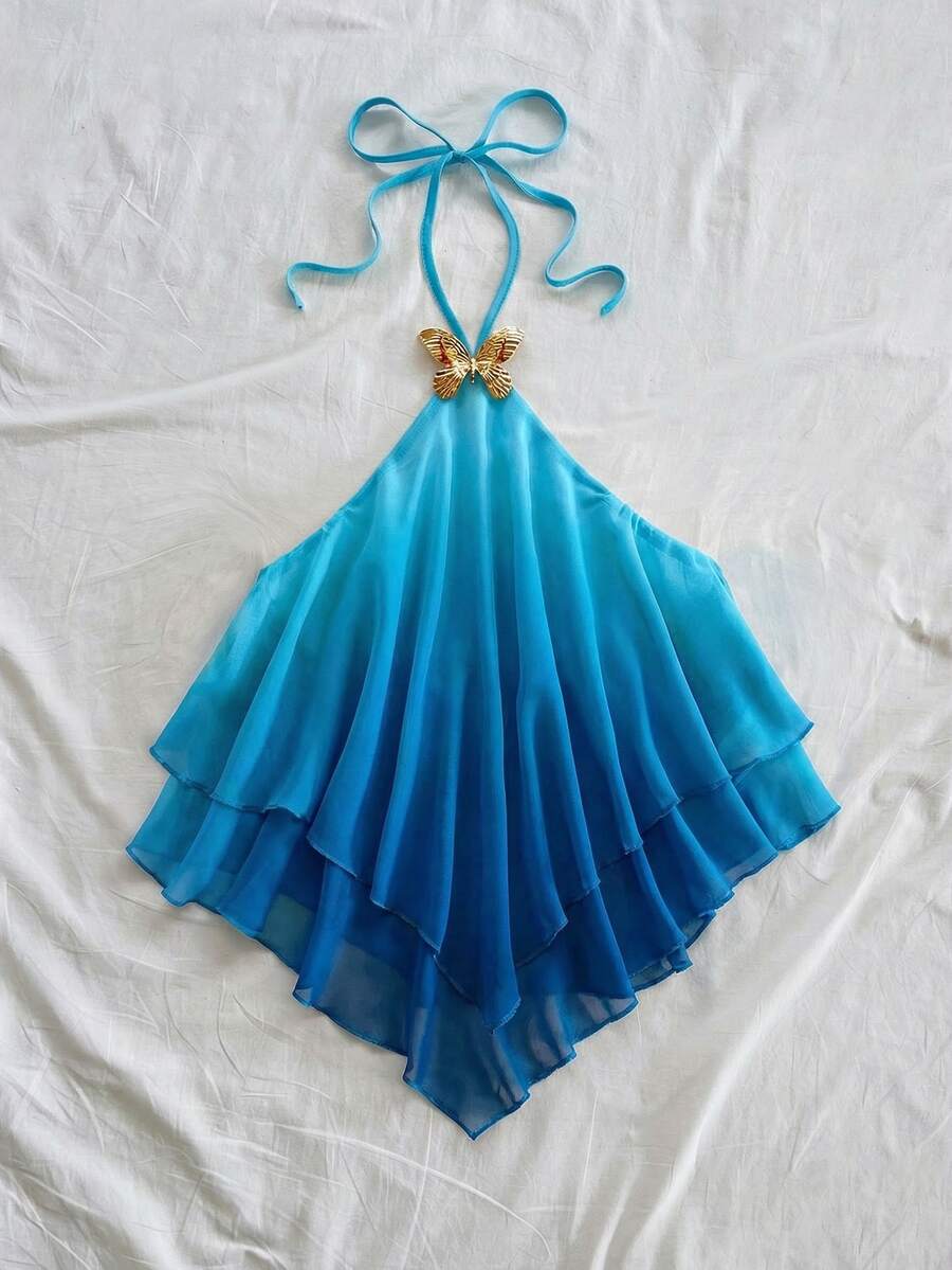 Women's gradient halter top with draped neck, butterfly metal accent, backless cut, and asymmetrical hem