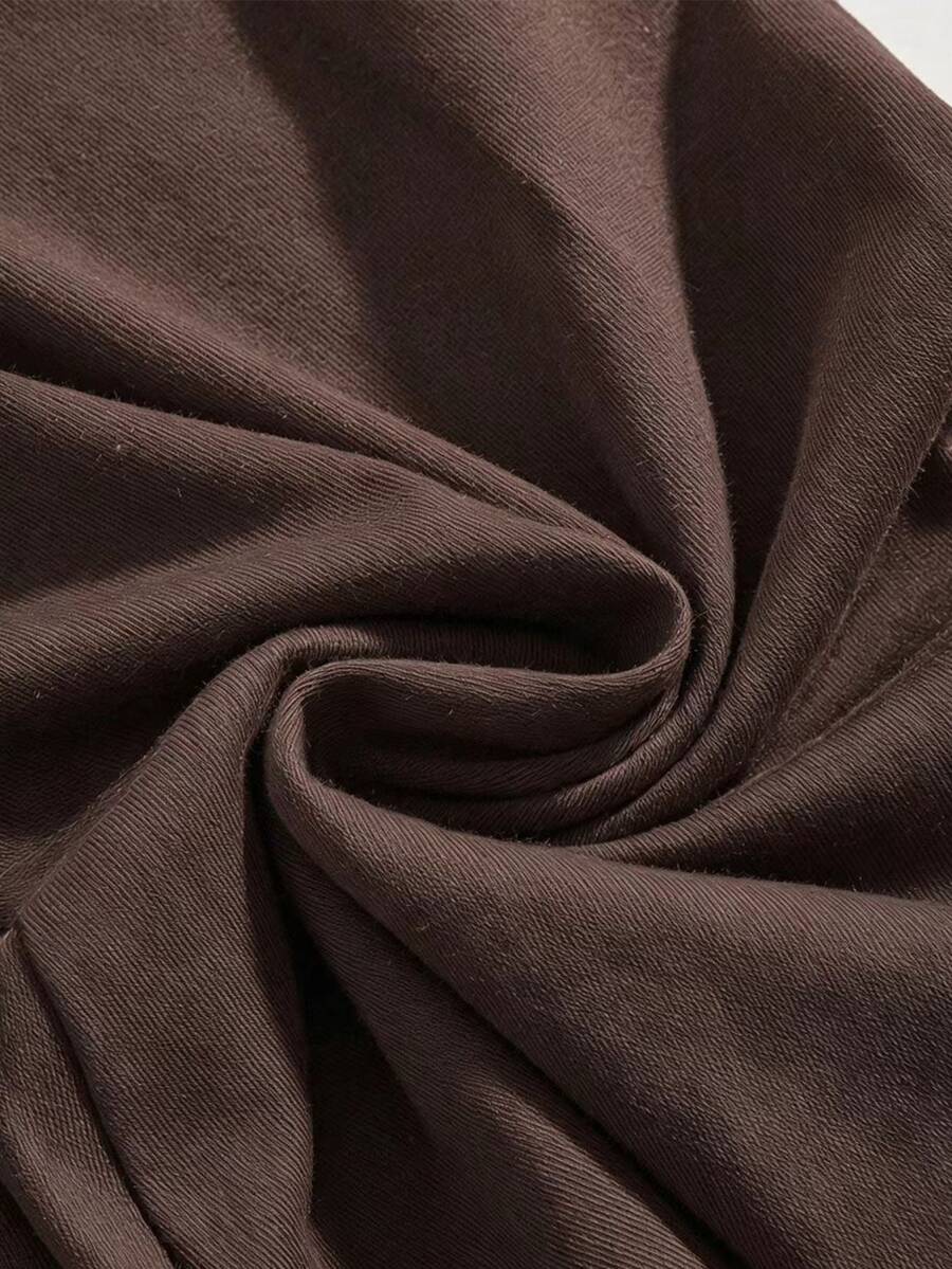 Women's low waist flare leg pants featuring an elastic drawstring waistband and ruched detail in knitted fabric.