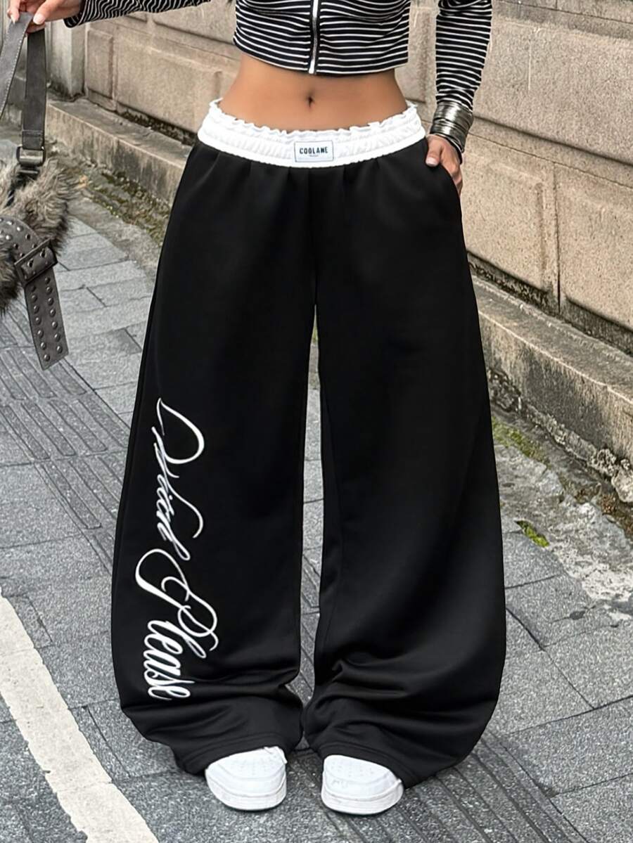 Women's striped straight leg casual trousers with elastic mid waist and side pockets