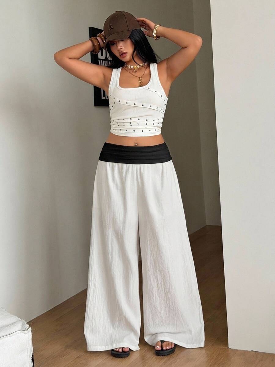 Women's plus size wide leg cotton pants featuring a relaxed loose fit and high waist design.