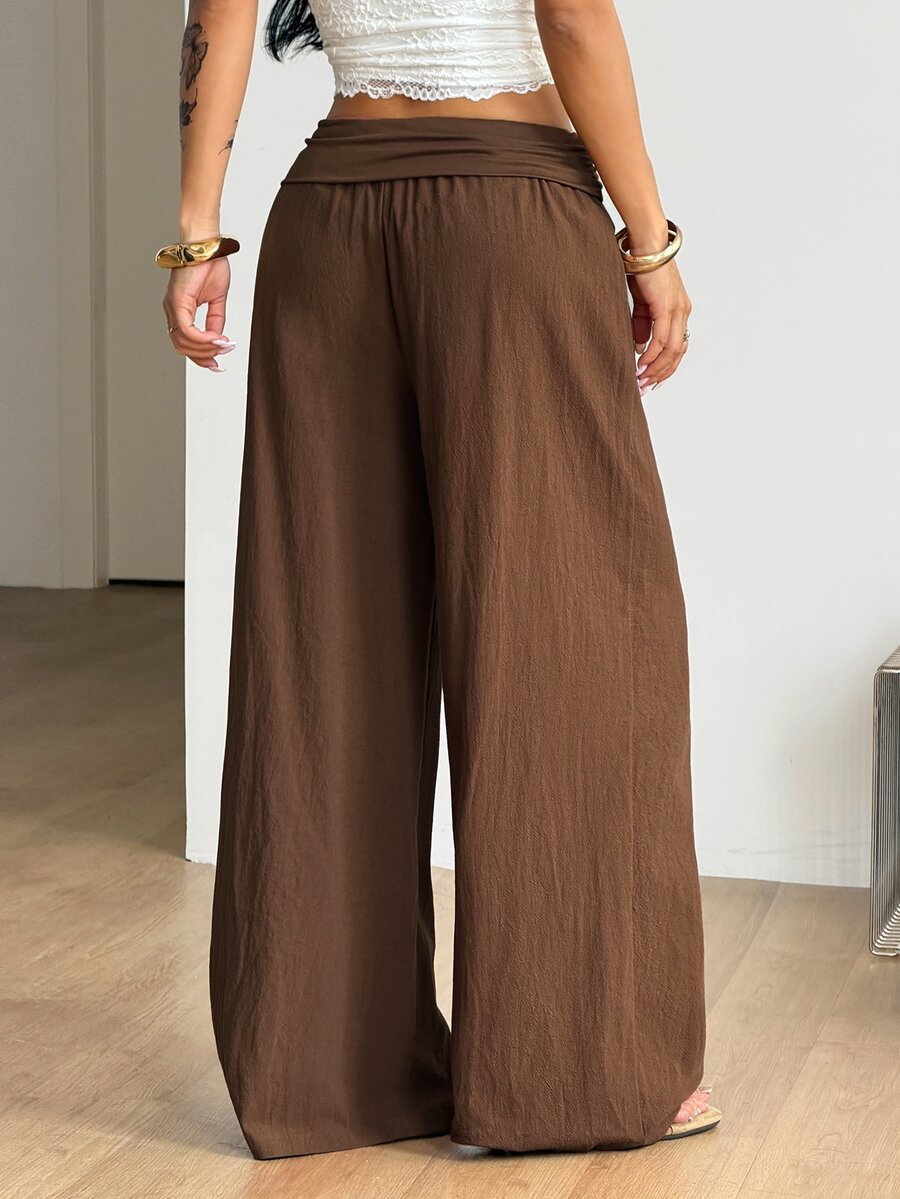 Women's plus size wide leg cotton pants featuring a relaxed loose fit and high waist design.