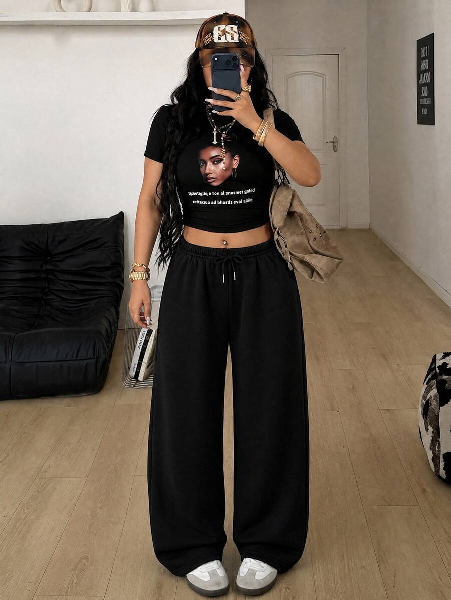 Women's loose wide leg casual sweatpants with an elastic waistband and side pockets