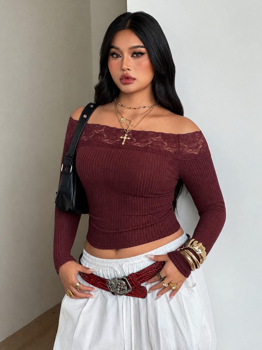 Women's striped off the shoulder long-sleeve top with contrast lace trim and ribbed knit texture.