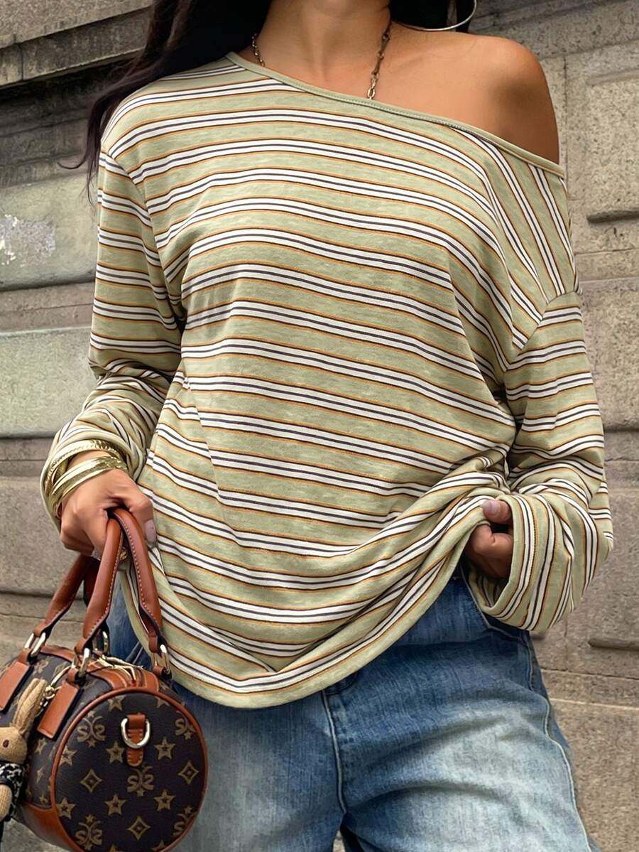 Women's brown striped boat neck long sleeve raglan T-shirt with a loose casual fit