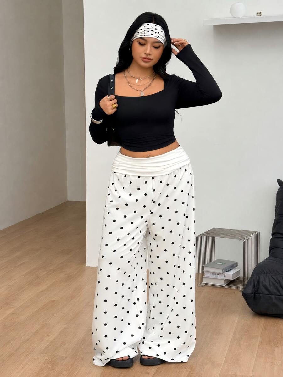 Women's plus size wide leg cotton pants featuring a relaxed loose fit and high waist design.