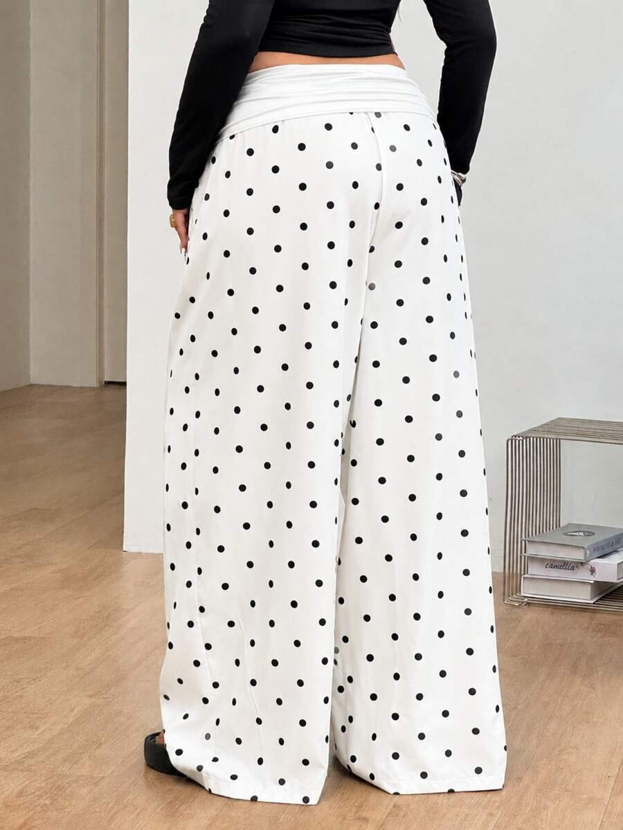 Women's plus size wide leg cotton pants featuring a relaxed loose fit and high waist design.