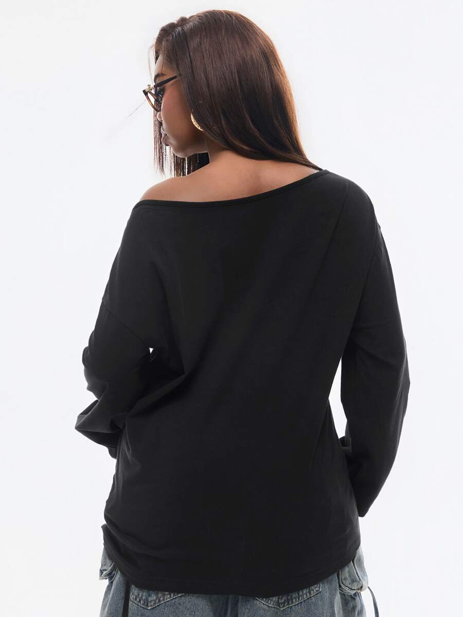 Women's brown striped boat neck long sleeve raglan T-shirt with a loose casual fit