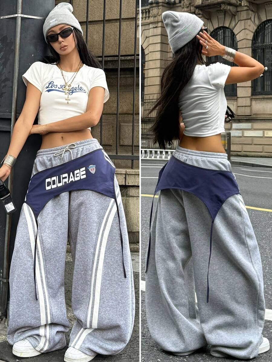 Women's casual grey plaid sweatpants featuring an elastic drawstring waistband, side pockets, and a relaxed loose fit.