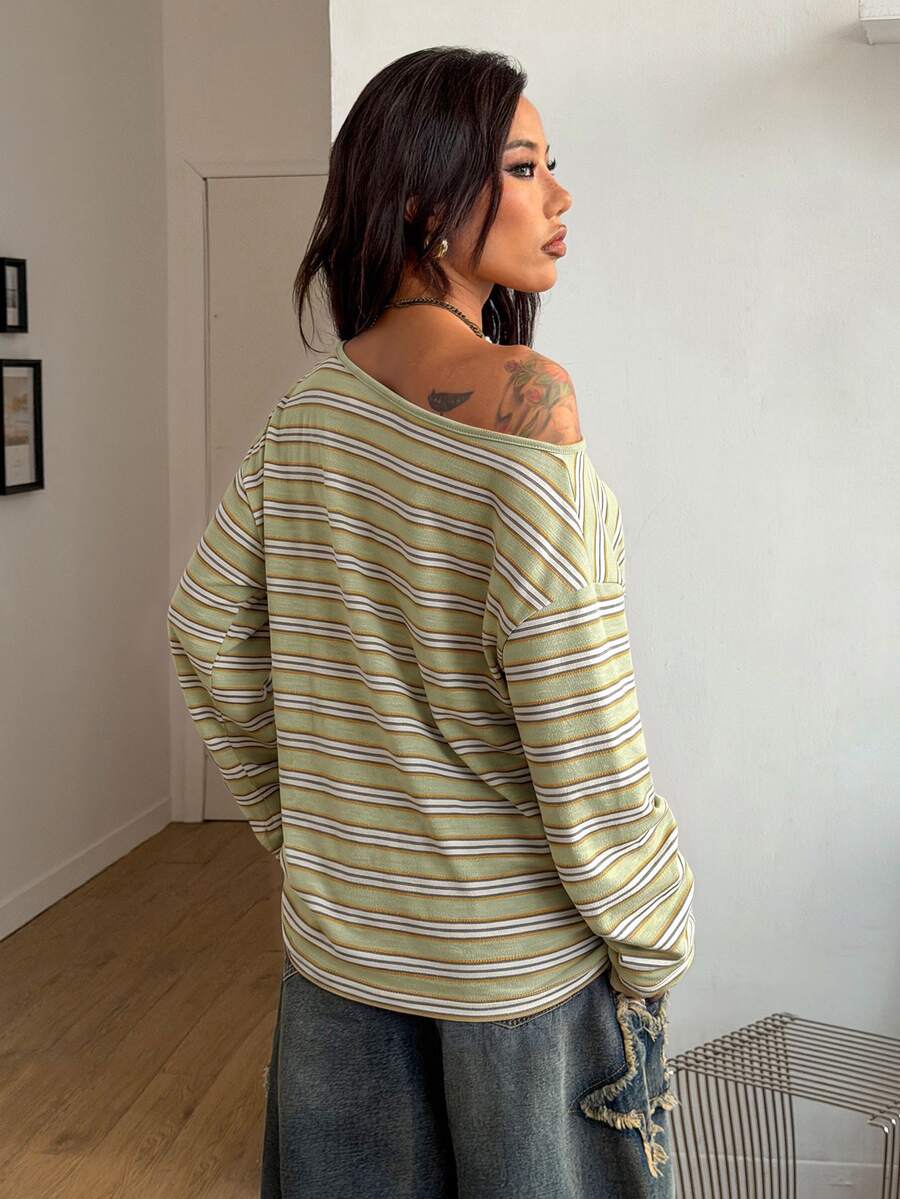 Women's brown striped boat neck long sleeve raglan T-shirt with a loose casual fit