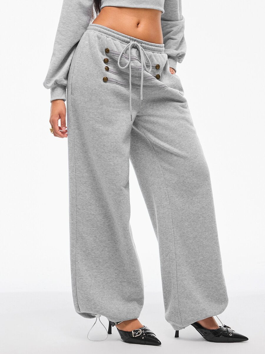 Women's wide leg trousers with a tree branch graphic pattern, loose fit, and mid-rise waist in woven fabric.