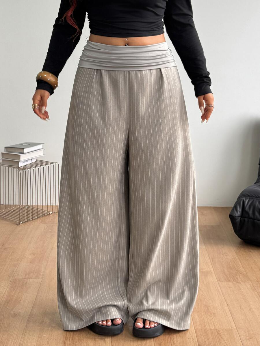 Women's plus size wide leg cotton pants featuring a relaxed loose fit and high waist design.