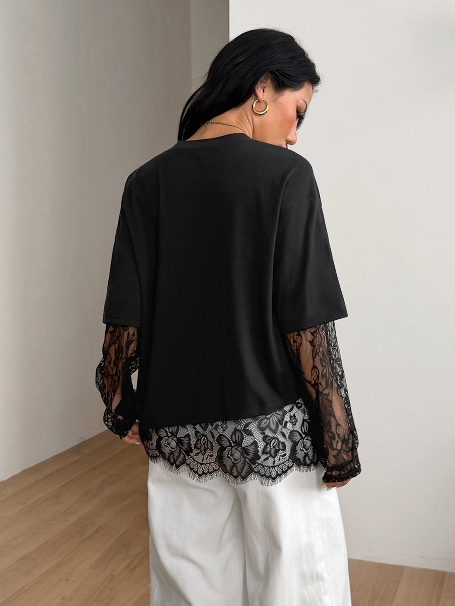 Women's casual graphic long sleeve t-shirt with a round neck, drop shoulder sleeves, and loose relaxed fit.