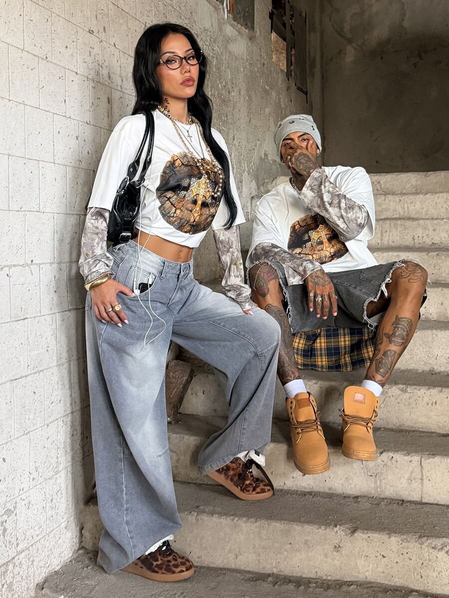 Women's casual graphic long sleeve t-shirt with a round neck, drop shoulder sleeves, and loose relaxed fit.