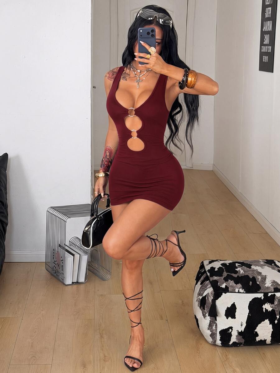 Women's slim fit cutout mini dress with scoop neck and metal buckle detail with arm sleeves