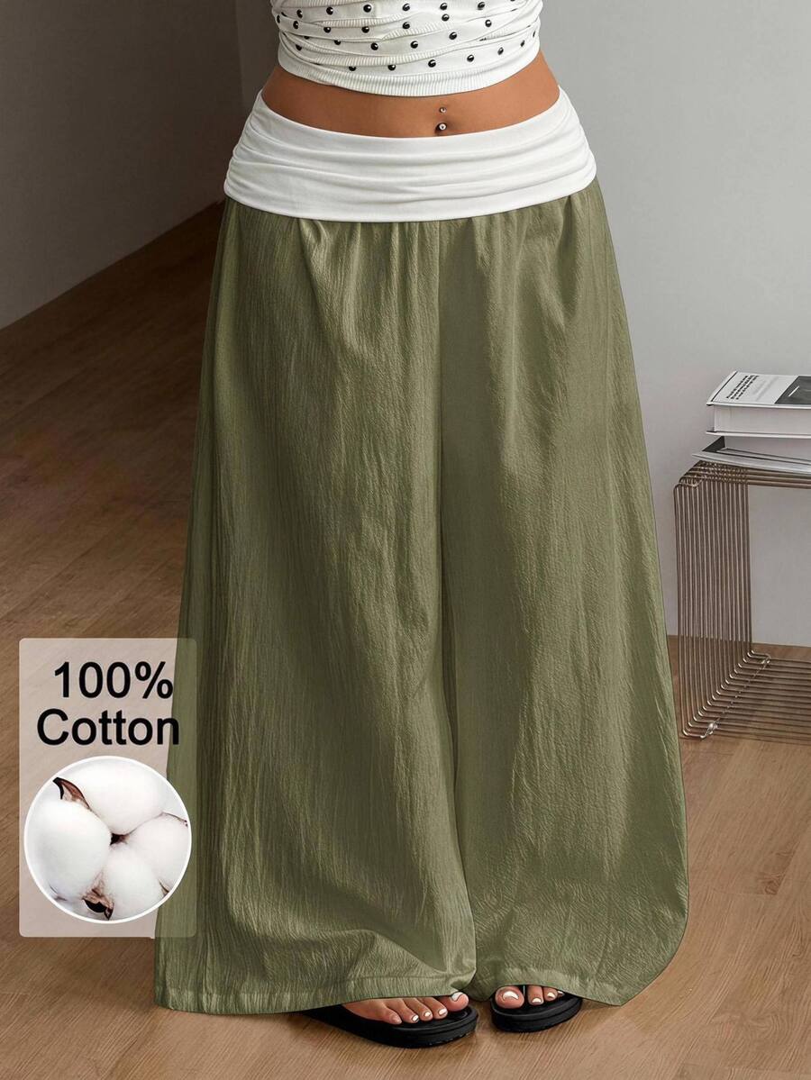 Women's plus size wide leg cotton pants featuring a relaxed loose fit and high waist design.
