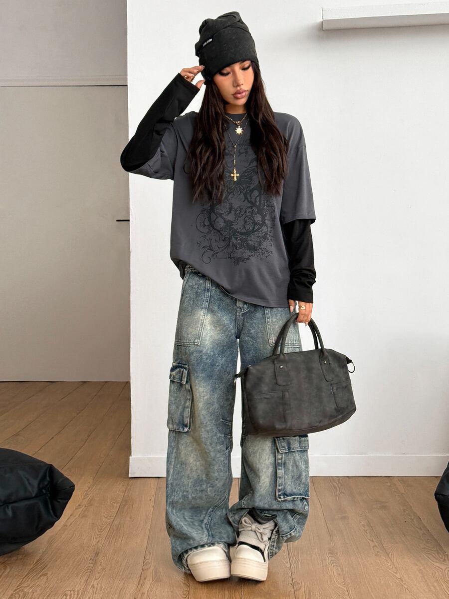 Women's casual graphic long sleeve t-shirt with a round neck, drop shoulder sleeves, and loose relaxed fit.