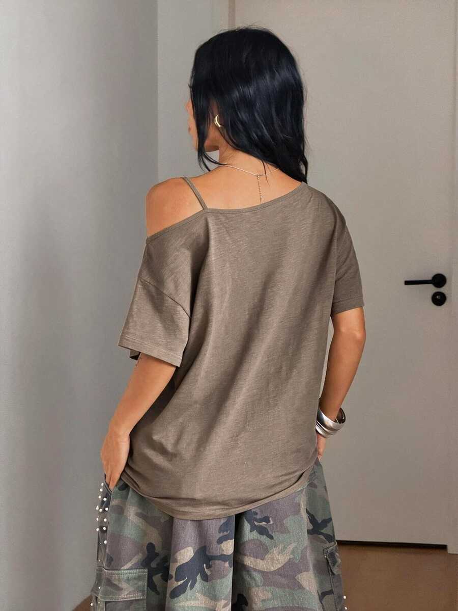 Women's casual loose fit cold shoulder cotton t-shirt with asymmetrical cutout neckline and short sleeves.