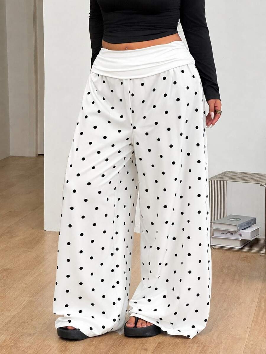 Women's plus size wide leg cotton pants featuring a relaxed loose fit and high waist design.