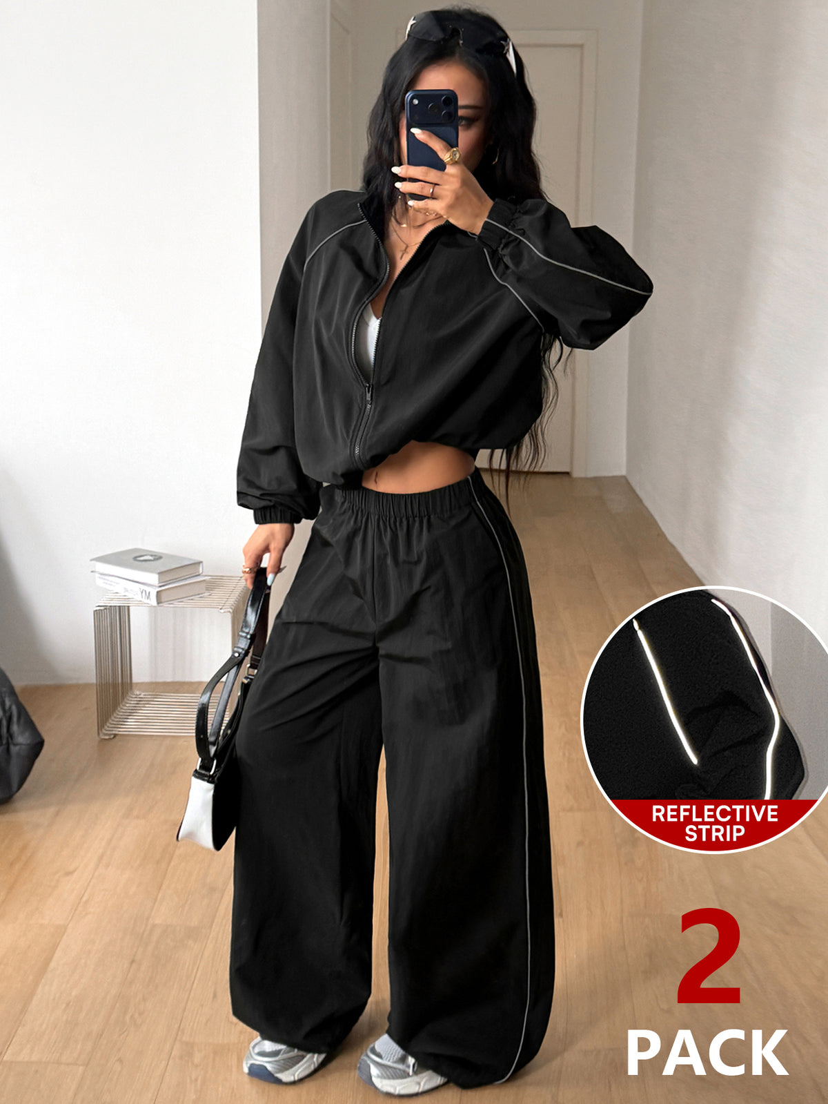Women's black casual reflective windbreaker sports set featuring a loose stand collar zip jacket and matching unlined pants.
