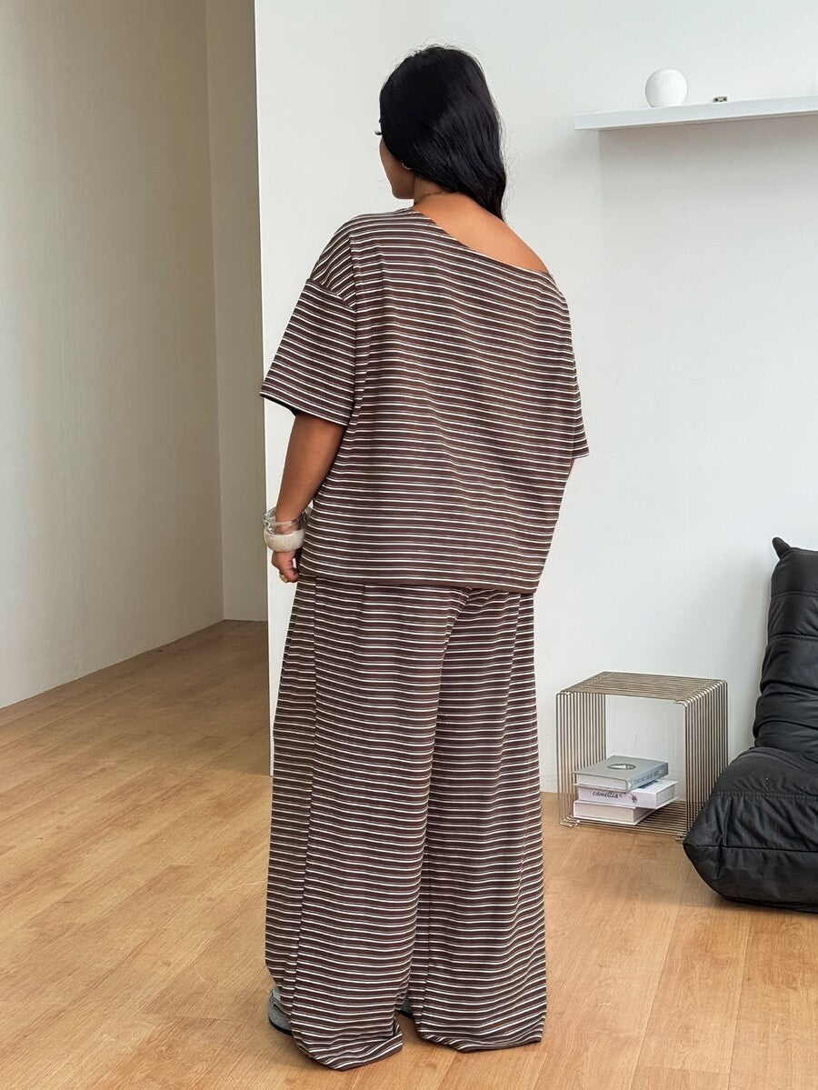 Women's two-piece lounge set featuring a loose drop shoulder asymmetrical neck short sleeve t-shirt and wide-leg knit pants with pockets.