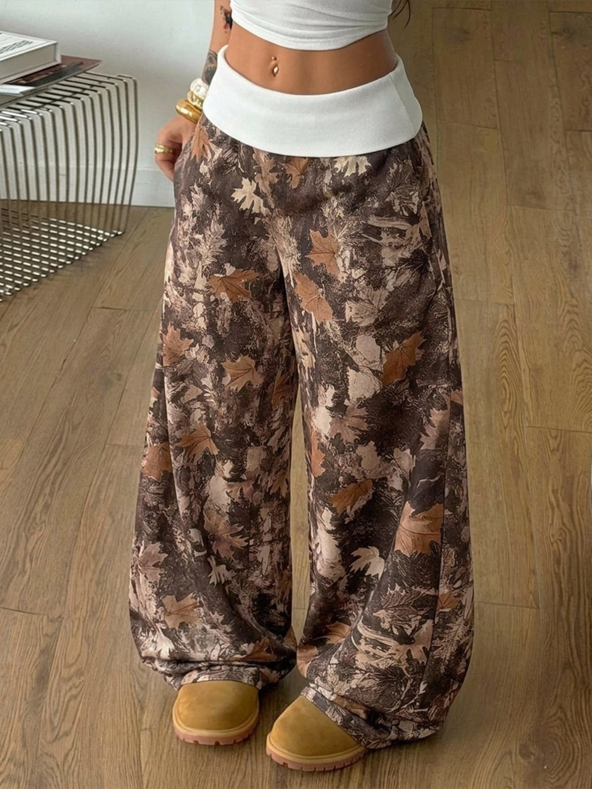 Women's wide leg trousers with a tree branch graphic pattern, loose fit, and mid-rise waist in woven fabric.