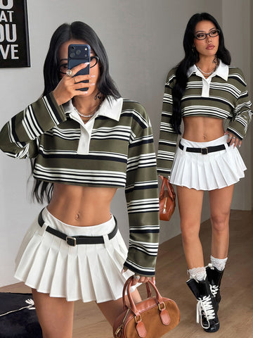 Women's green and white striped crop polo shirt with long drop-shoulder sleeves and a button front collar.