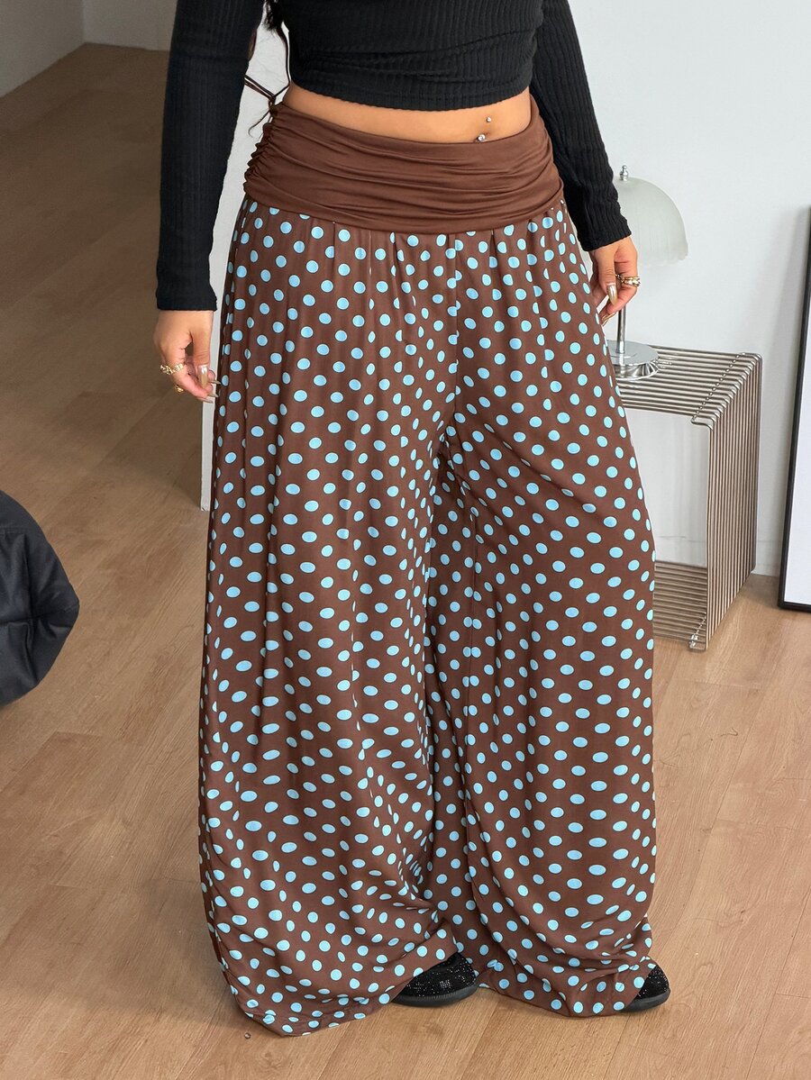 Women's plus size wide leg cotton pants featuring a relaxed loose fit and high waist design.