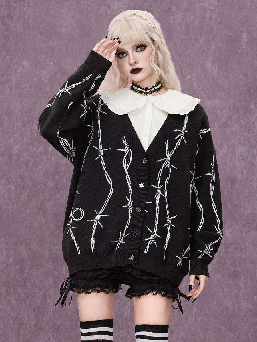 Women's oversized gothic thorn jacquard knit cardigan with V-neckline, button-front closure, and long drop-shoulder sleeves.