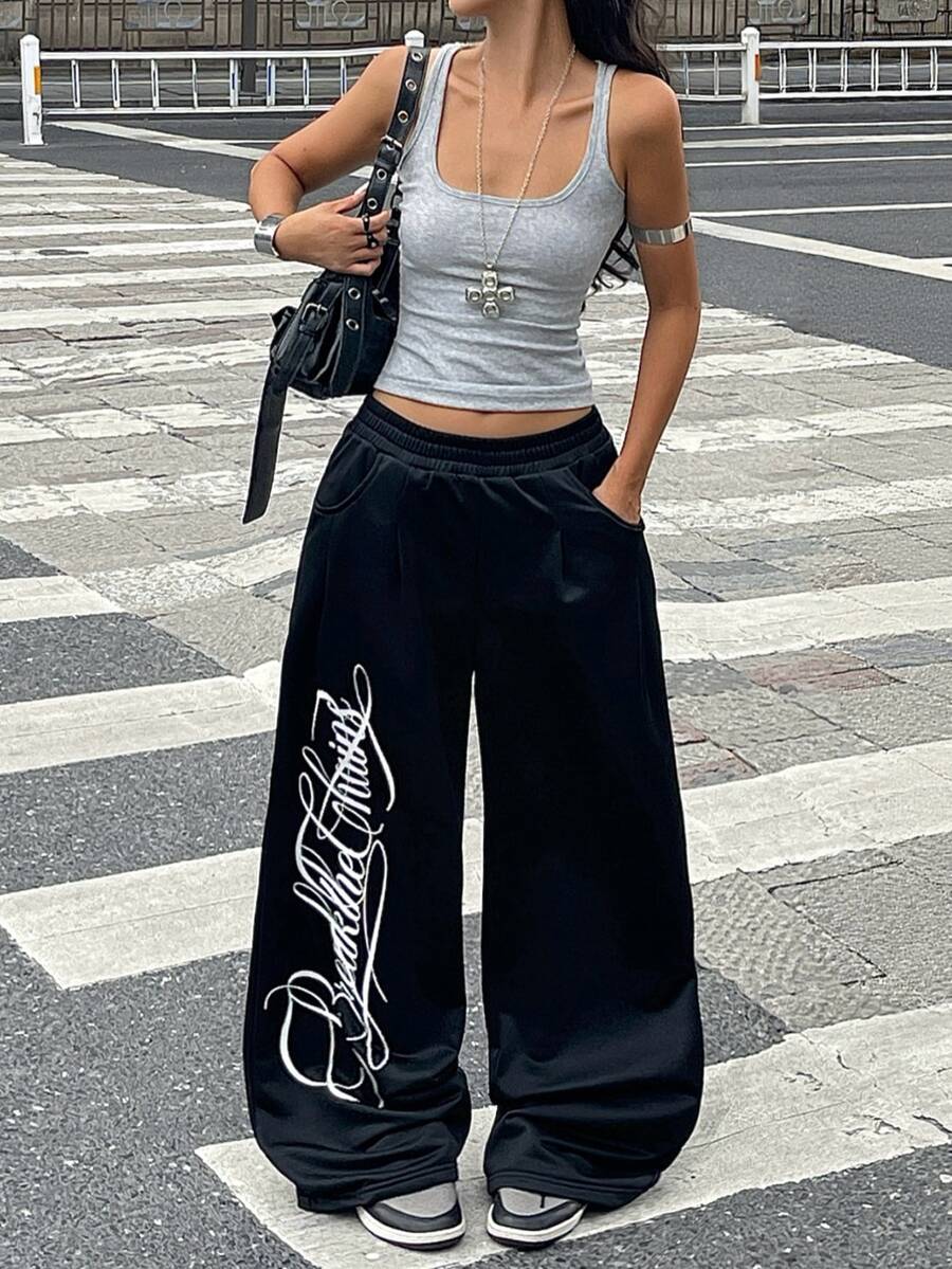 Women's loose straight leg casual pants with drawstring elastic waist and pockets