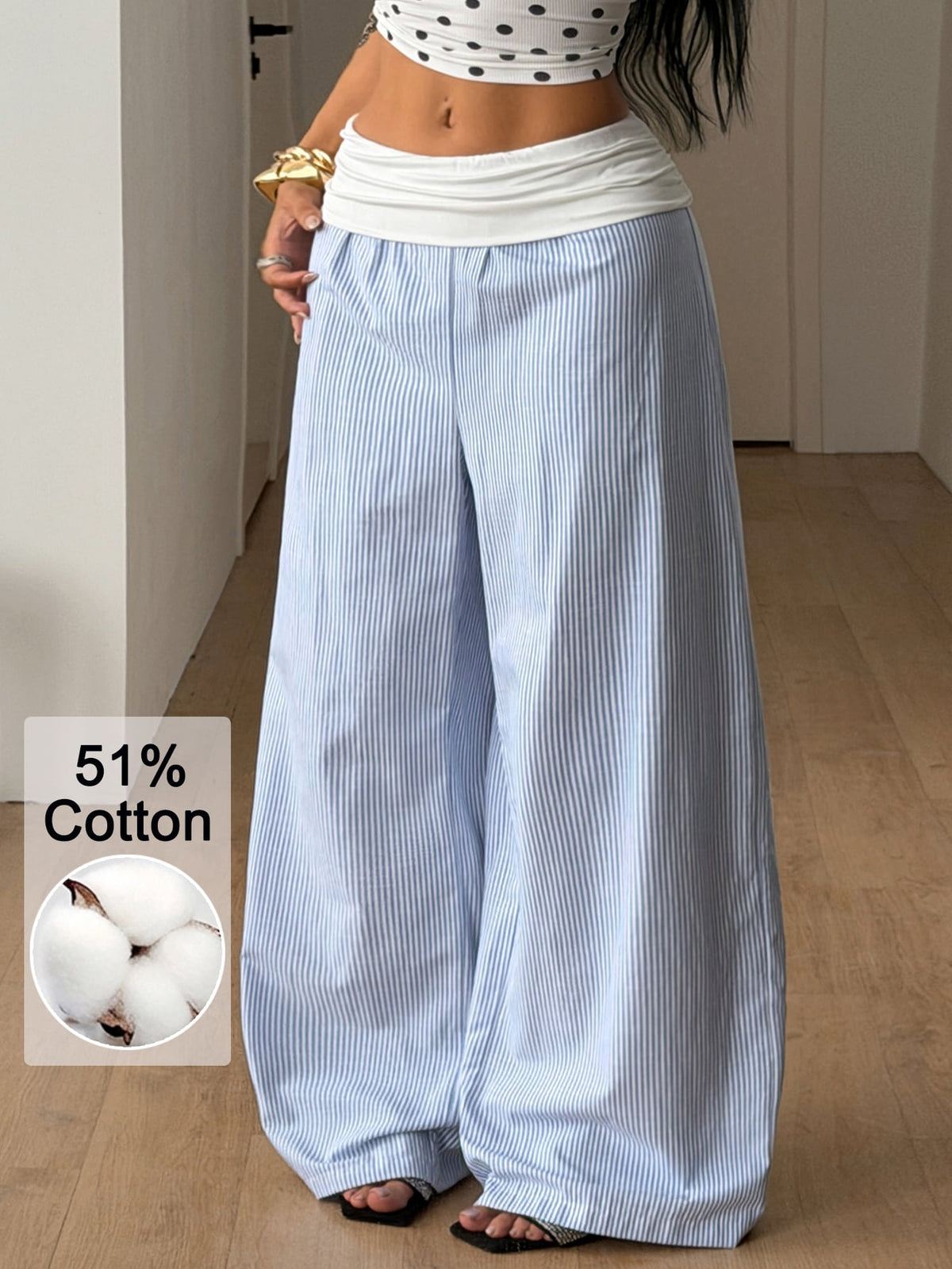 Women's plus size wide leg cotton pants featuring a relaxed loose fit and high waist design.
