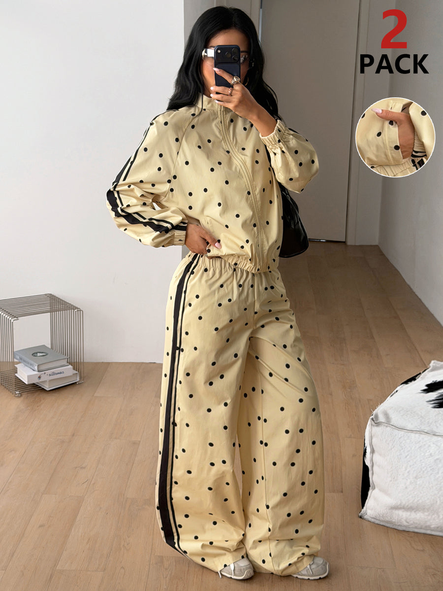 Women's two-piece sporty casual tracksuit set featuring a stand collar zip-up jacket with contrast binding and matching loose parachute pants.