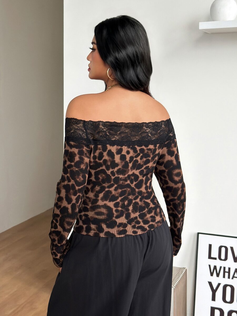 Women's striped off the shoulder long-sleeve top with contrast lace trim and ribbed knit texture.