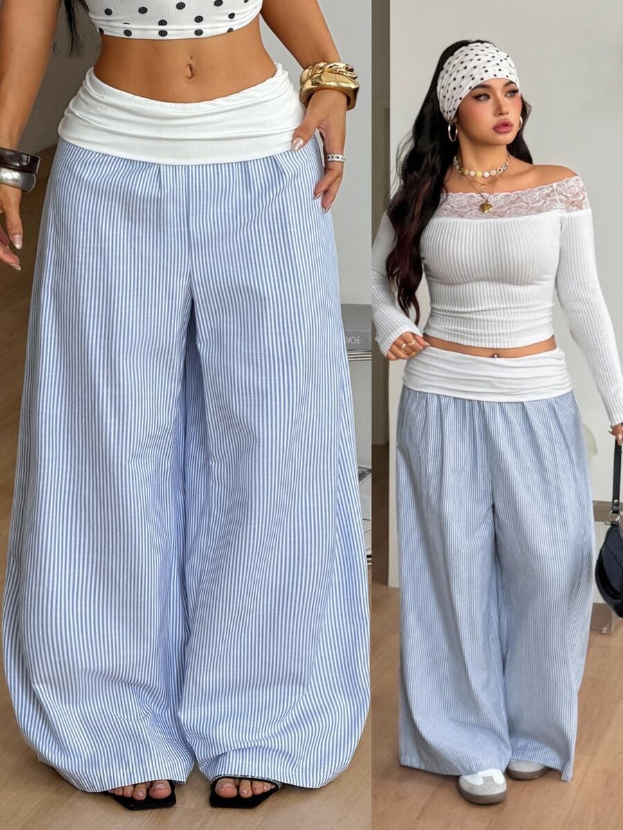 Women's plus size wide leg cotton pants featuring a relaxed loose fit and high waist design.