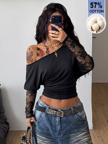Women's black long sleeve t-shirt featuring delicate contrast lace details and a boat neckline in a knitted stretch fabric.