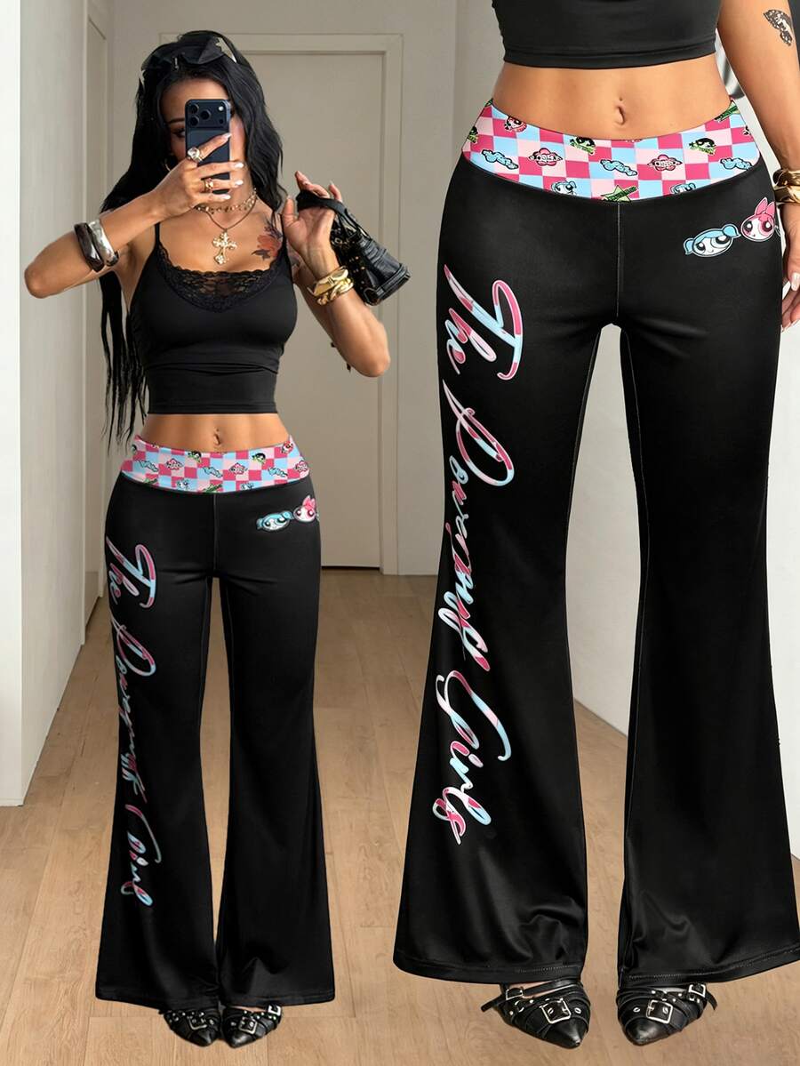 Women's black leopard print flare leg sweatpants with an elastic mid waist crafted from cotton knitted fabric.