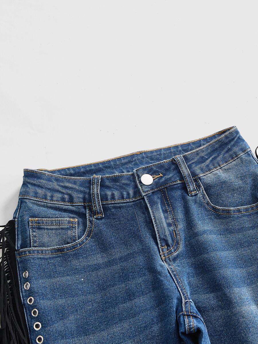 Women's ultra low waist flare jeans in washed stretch denim featuring an extra long bootcut leg and zipper fly closure.