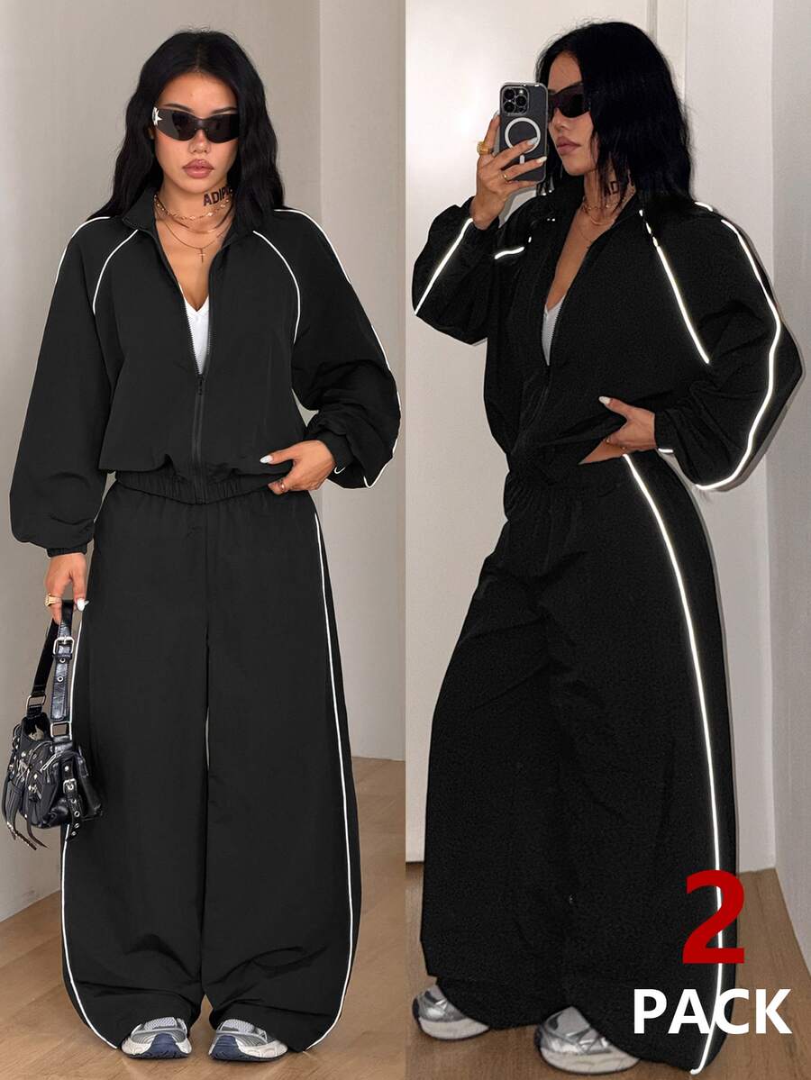 Women's black casual reflective windbreaker sports set featuring a loose stand collar zip jacket and matching unlined pants.