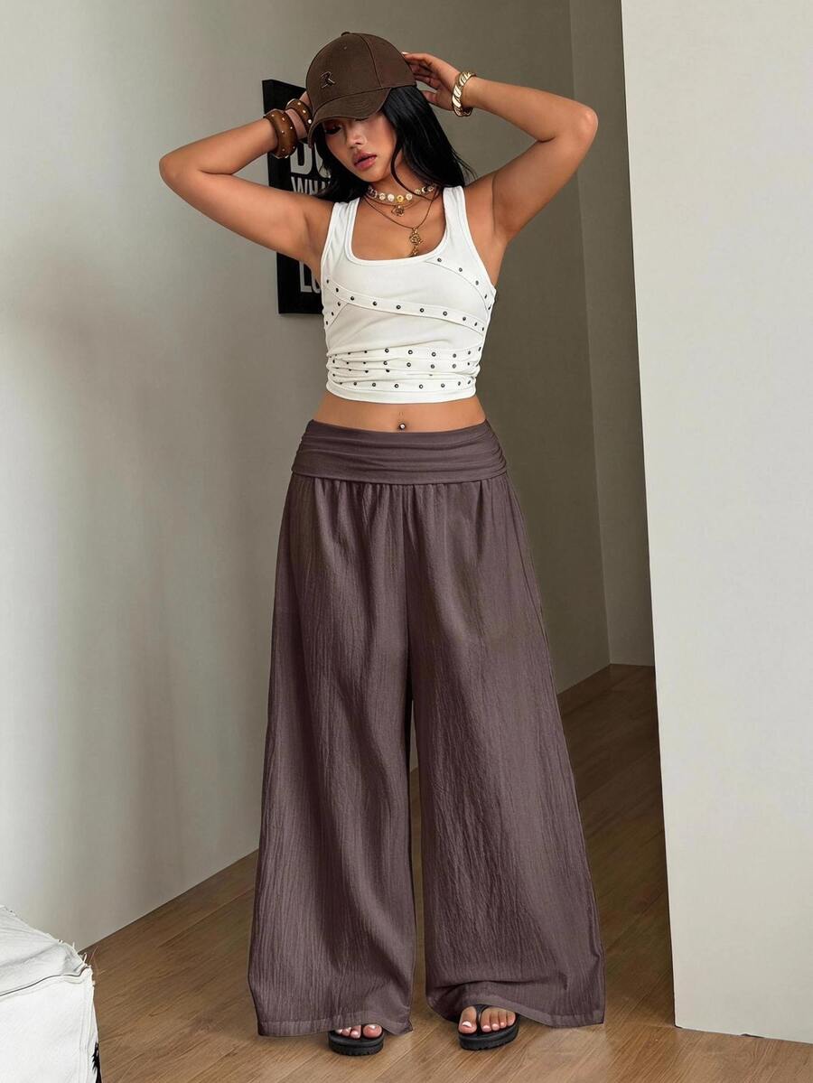 Women's plus size wide leg cotton pants featuring a relaxed loose fit and high waist design.