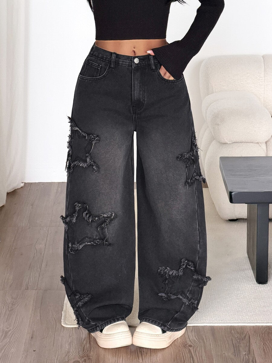 Front view of women's loose wide leg denim jeans featuring a mid waist, classic front pockets, and a zipper fly closure.