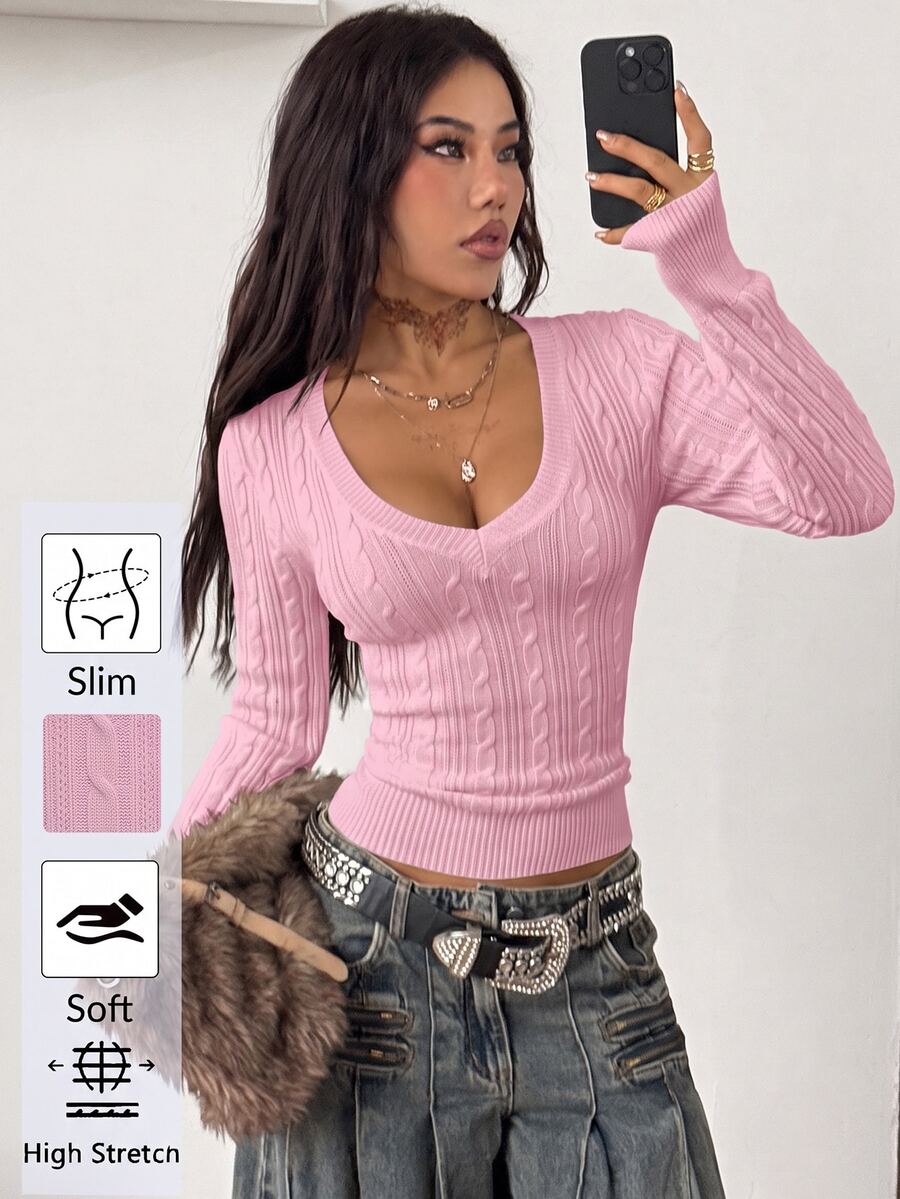 Women's slim fit cable-knit long sleeve sweater featuring a V-neckline and ribbed knit details.